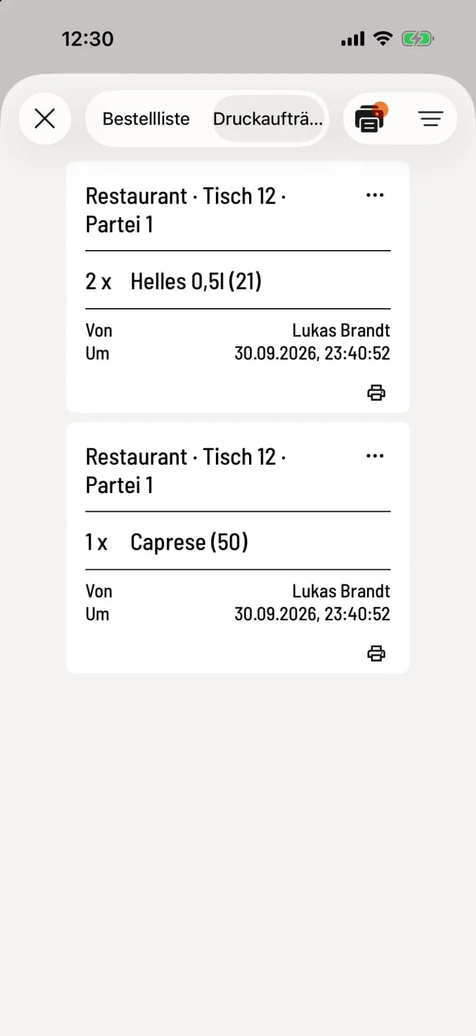 Cash register app, print jobs with two open kitchen receipts for table 12, each with a printer icon, and the printer icon with an orange dot at the top.
