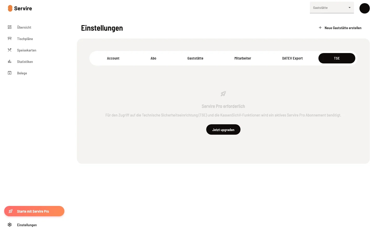 TSE-Tab in den Servire Web desk Einstellungen mit dem Hinweis 'Servire Pro erforderlich' und Jetzt-upgraden-Button